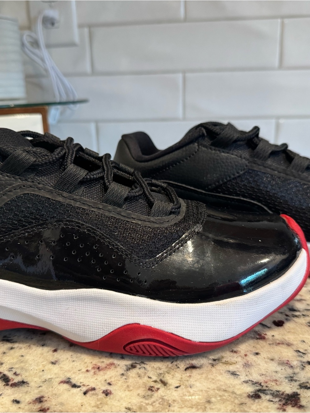 Nike Kids Black and Red Sneakers with White Midsole